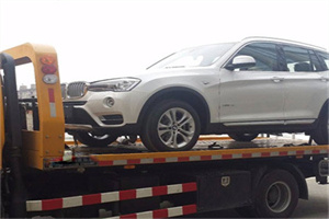 新成路拖车24小时服务电话